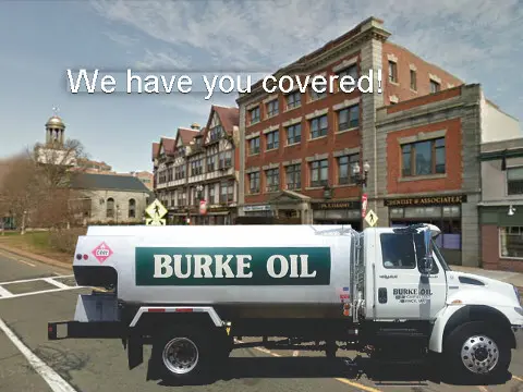 a banner with The Burke Oil tanker in the background